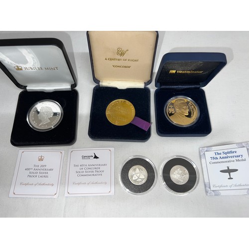 635 - Coins to include The Spitfire 75th Anniversary commemorative medal, The 2019 400th Anniversary solid... 