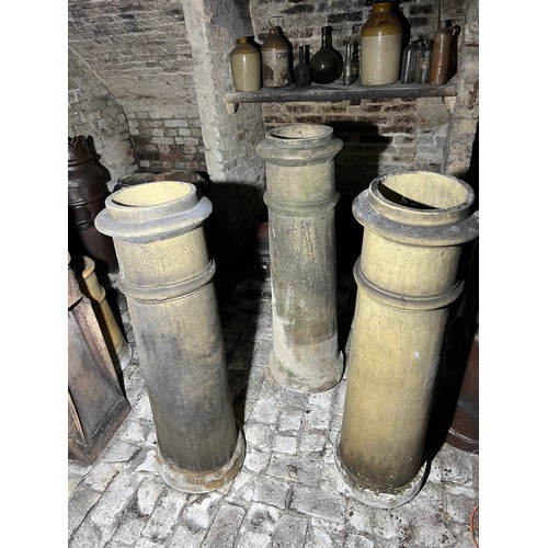 211 - Three Long John terracotta chimney pots two stamped 'James Goody, Darfield Works, Barnsley', 124cm h