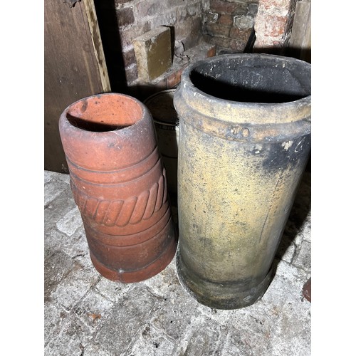 212 - Two chimney pots 72cm h