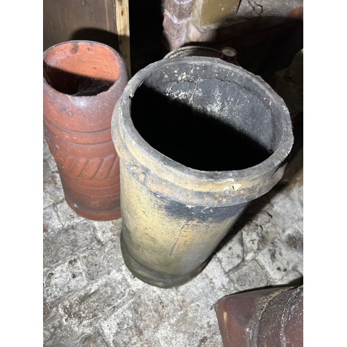 212 - Two chimney pots 72cm h