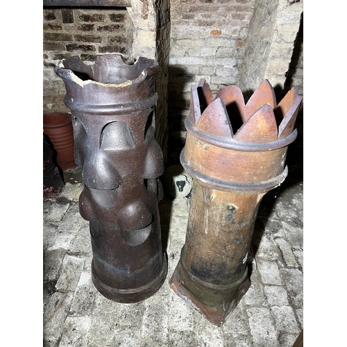 213 - Two chimney pots tallest 105cm h