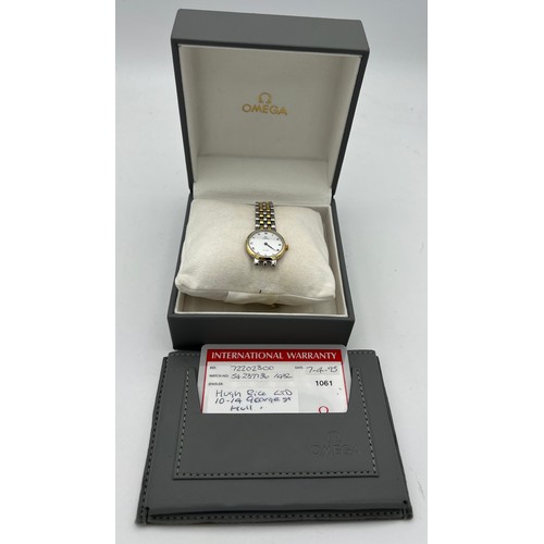 994 - An Omega De Ville ladies wristwatch with box and papers and spare links.