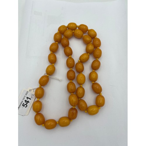 541 - Two string of butterscotch amber beads, approx length 80 & 52cm. 213.9gm.