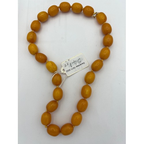 541 - Two string of butterscotch amber beads, approx length 80 & 52cm. 213.9gm.