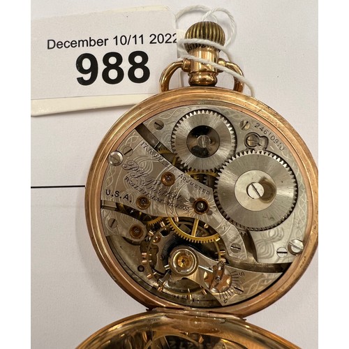 988 - A nine carat gold hunter pocket watch by Waltham. Keyless wind with white enamel dial with Roman num... 