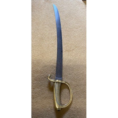 939 - A French model 1816 briquet short sword with brass hilt and grip and curved edge blade stamped V1837... 