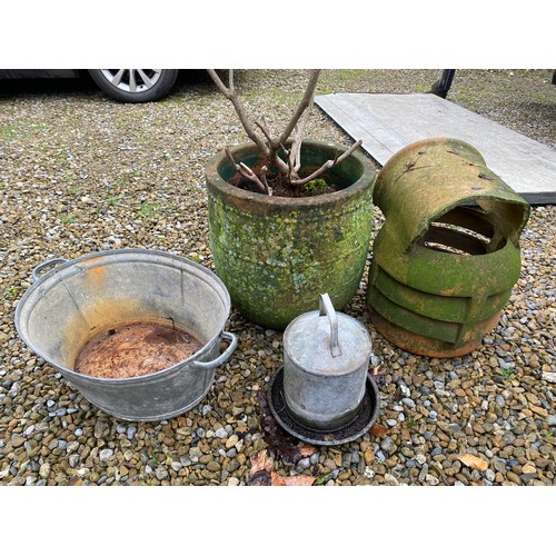 98 - Terracotta plant pot, galvanised bath and drinker and a chimney cowl.