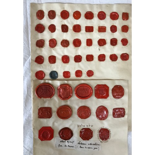 1106 - A large collection of 19thC Grand Tour Red Wax Intaglios along with 23 plaster impressions of coins.