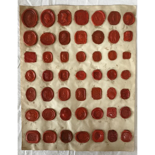 1106 - A large collection of 19thC Grand Tour Red Wax Intaglios along with 23 plaster impressions of coins.