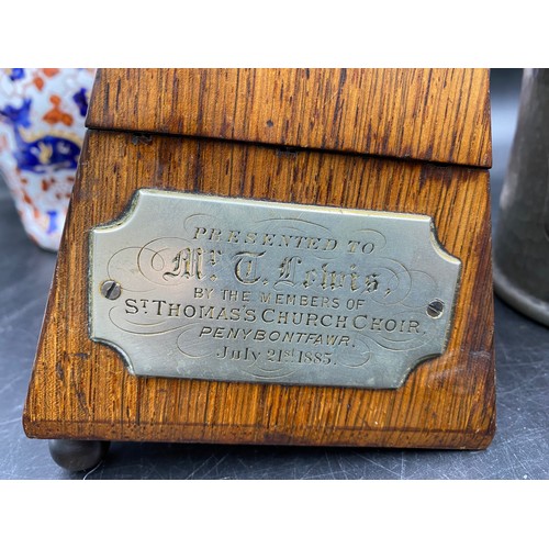 1097 - A miscellany to include a 19thC oak metronome with inscribed plaque dated July 21st 1885, 2 x carved... 