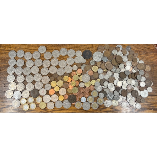 784 - A collection of coins to include mainly 1973 50p's, sixpences, Francs, Cents, etc.