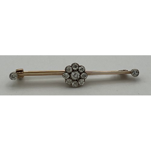 418 - Edwardian bar brooch set with diamonds in unmarked yellow metal. Length 5cm. Weight 2.9gm.