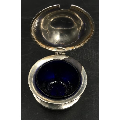 723 - A silver cruet set two with blue glass liners two marked Birmingham 1918 the other Birmingham 1919. ... 