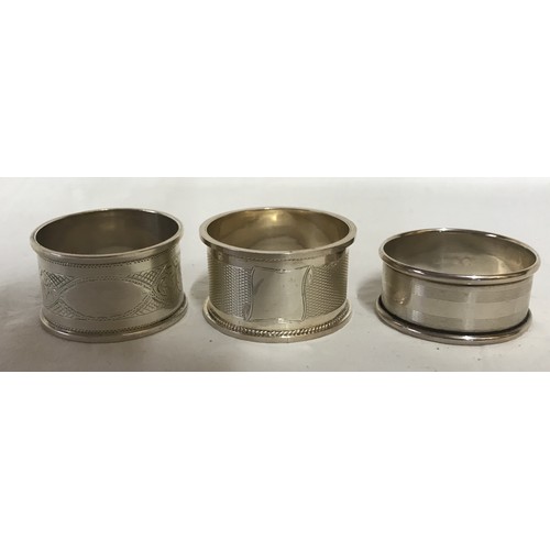 726 - Eight silver napkin rings total weight 100gms Birmingham 1932, 5 matching and 3 individual.