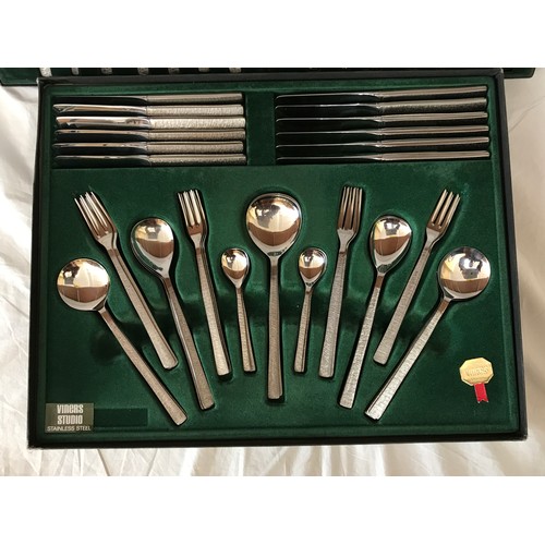 676 - Gerald Benney for Viners, 58 pieces of stainless steel table cutlery for eight persons with Bark pat... 