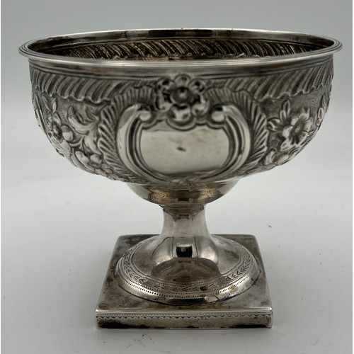 739 - A silver pedestal bowl Dublin 1791, maker's mark I.I (unknown) with foliate repoussé decoration and ... 