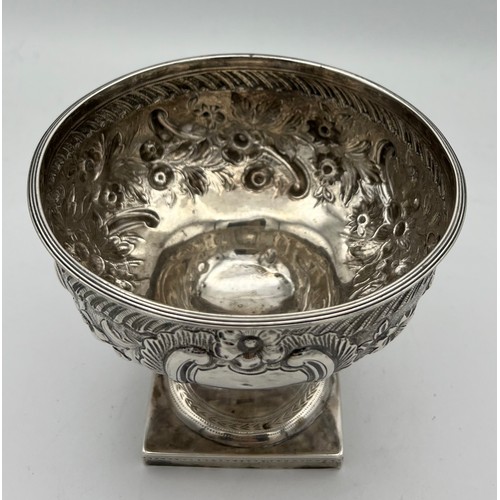 739 - A silver pedestal bowl Dublin 1791, maker's mark I.I (unknown) with foliate repoussé decoration and ... 