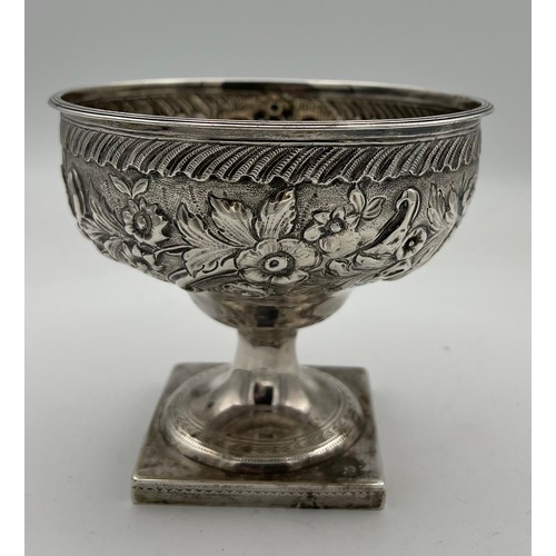 739 - A silver pedestal bowl Dublin 1791, maker's mark I.I (unknown) with foliate repoussé decoration and ... 