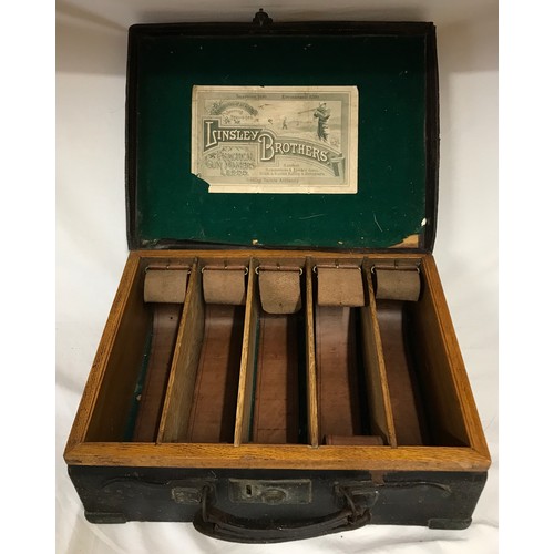 1095 - A Victorian leather cartridge case with five interior divisions and trade label for Linsley Brothers... 