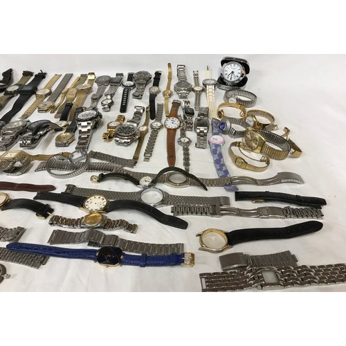 668 - A large collection of watches and watch parts to include some parts from Boss, Lorus, Sekonda and Ci... 