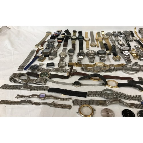 668 - A large collection of watches and watch parts to include some parts from Boss, Lorus, Sekonda and Ci... 