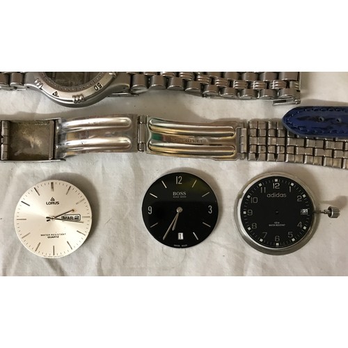 668 - A large collection of watches and watch parts to include some parts from Boss, Lorus, Sekonda and Ci... 