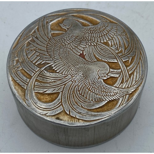 1076 - Designed by Rene Lalique for Roger Et Gallet, a round aluminium powder box with entwined bird motif ... 