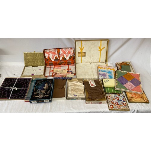 1077 - A quantity of boxed vintage items to include silk stockings, London holeproof Countess Pure Silk Hos... 