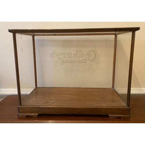 1078 - A vintage counter top Cadbury's Chocolates shop display cabinet with  oak frame. 35.5 h x 48 w x 25.... 