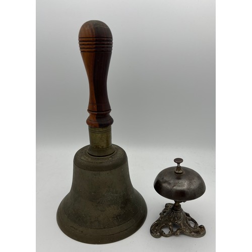 816 - A good quality 19th century hand bell 27cm h together with table top bell.