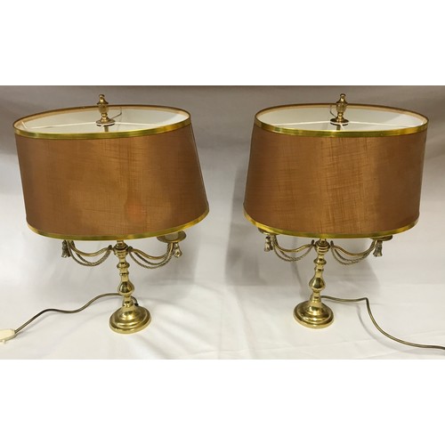 914 - Matching pair of table lamps with brass bases, rope decoration and matching shades approx 55cm h.