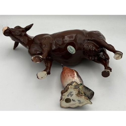 231 - Beswick brown cow 24cm long, Beswick Robin and a Royal Worcester First Dance modelled by F.G.Doughty... 