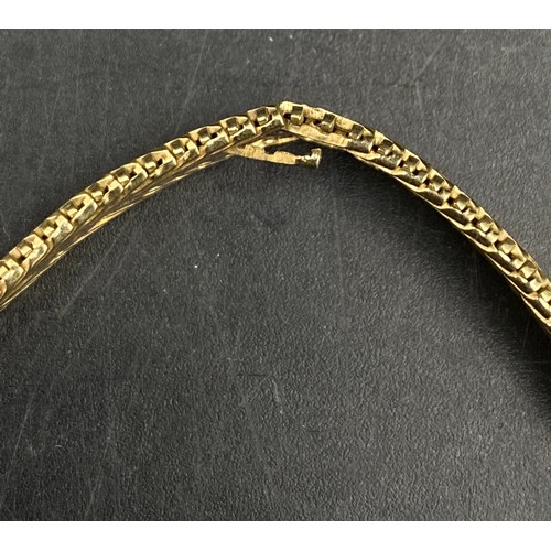 445 - Nine carat gold tri-colour bracelet. Weight 7.8gm.