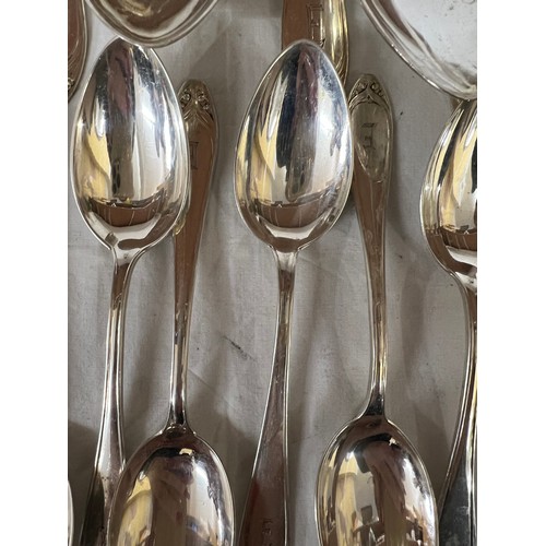 692 - An extensive suite of German silver cutlery. Marked with German marks and Posen .800. Initialled E. ... 