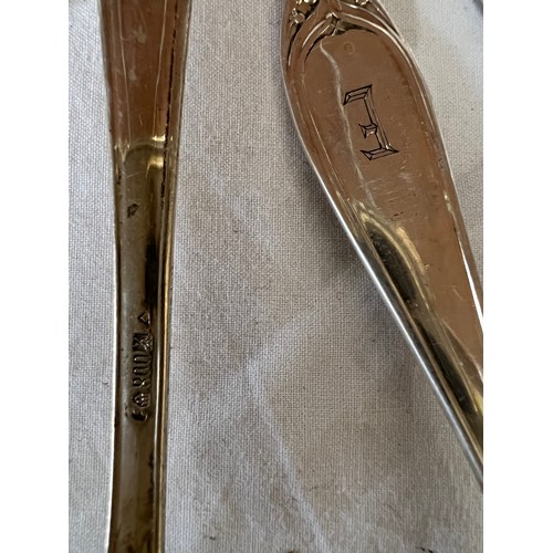 692 - An extensive suite of German silver cutlery. Marked with German marks and Posen .800. Initialled E. ... 