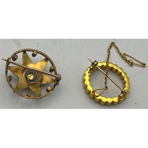 448 - Two brooches, one set with pearls and central diamond and marked 15ct, the other unmarked yellow met... 