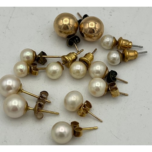 452 - Seven pairs of mainly pearl earrings with 9 carat and 18 carat posts.