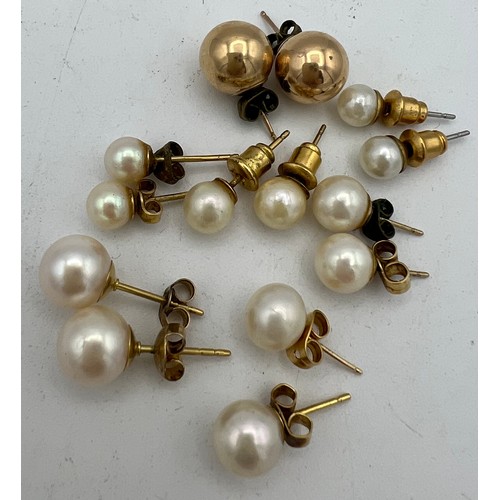 452 - Seven pairs of mainly pearl earrings with 9 carat and 18 carat posts.