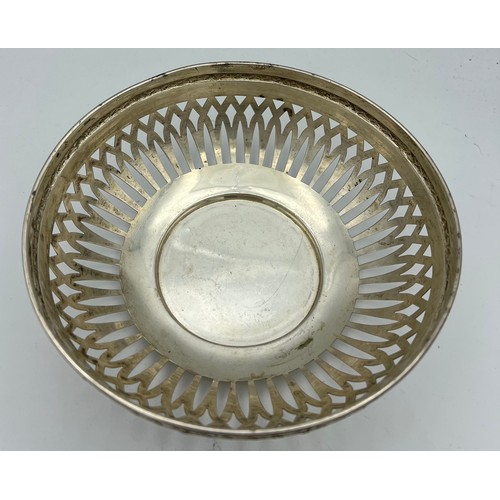 698 - A German silver bowl with pierced decoration. Weight 245gm, size 20cm d.