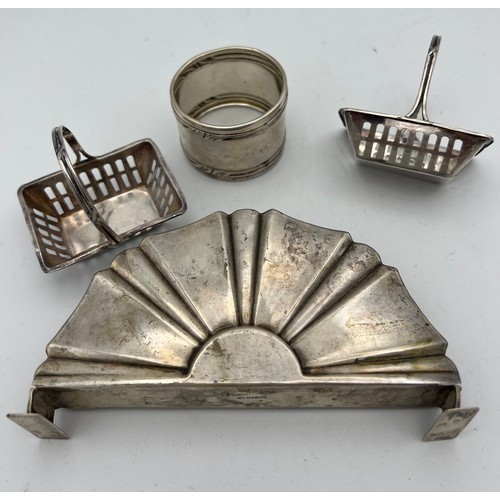 699 - Silver to include two baskets marked .925, German silver napkin ring .800 and a German silver menu h... 