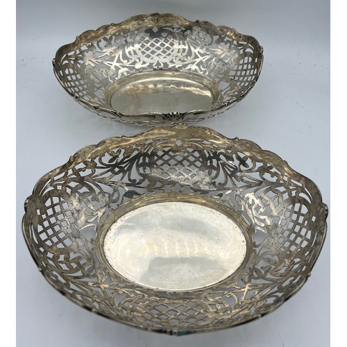 703 - A pair of German silver oval pierced dessert dishes marked Friedlander 800 c.1910. 20 x 26 cm. Total... 