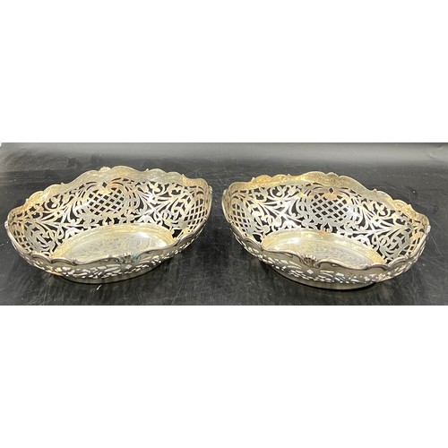 703 - A pair of German silver oval pierced dessert dishes marked Friedlander 800 c.1910. 20 x 26 cm. Total... 