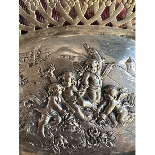 705 - German silver oval dish depicting cherubs at play with pierced border. Size 20.5 x 14.5cm.  Weight 1... 