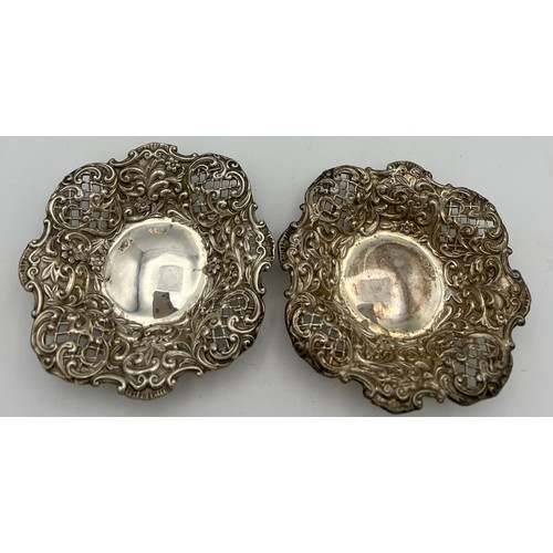 706 - A pair of pierced silver bonbon dishes Birmingham 1897. Maker Henry Mathews. Size 11.5cm d. Total we... 