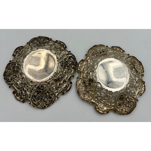 706 - A pair of pierced silver bonbon dishes Birmingham 1897. Maker Henry Mathews. Size 11.5cm d. Total we... 