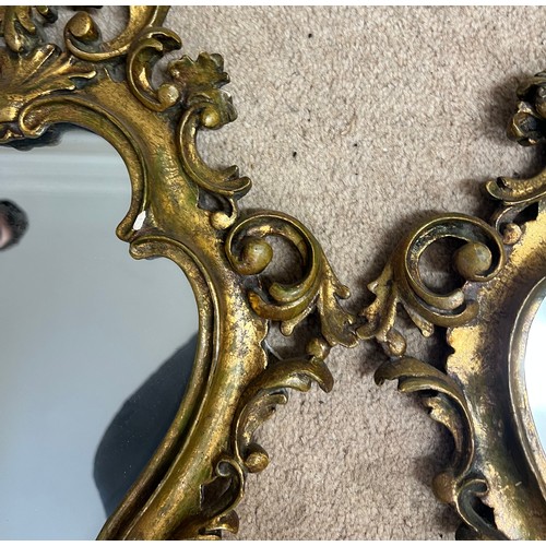 947 - Two ornate gilt framed wall mirrors. 52 x 37 cm.