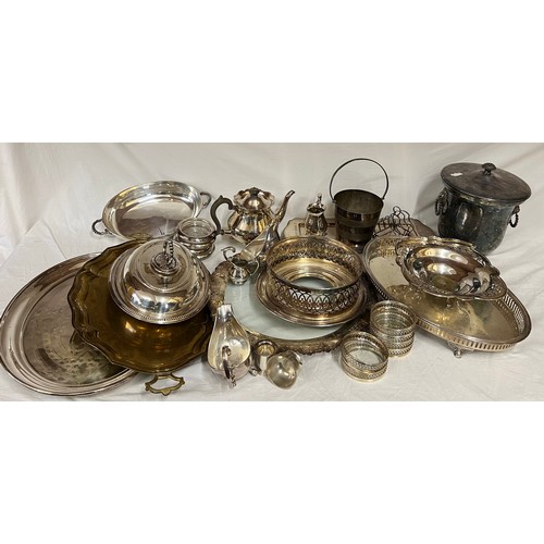 689 - A large quantity of silver plated items to include entrée dishes, ice bucket, trays, wine coasters e... 