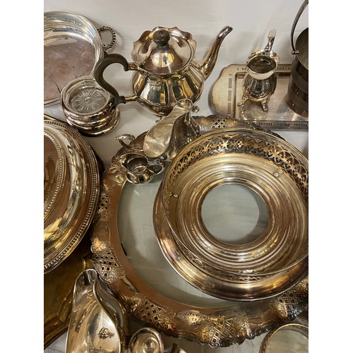 689 - A large quantity of silver plated items to include entrée dishes, ice bucket, trays, wine coasters e... 