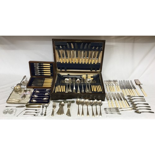 690 - A large quantity of silver plated cutlery to include lobster and walnut picks, some in original boxe... 