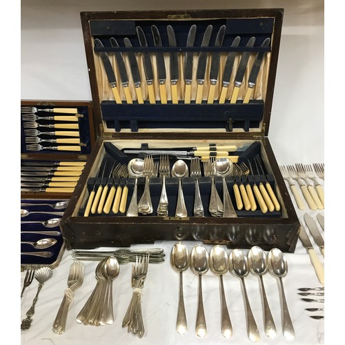 690 - A large quantity of silver plated cutlery to include lobster and walnut picks, some in original boxe... 